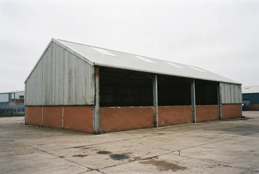 The same unit with the roof stripped and recovered